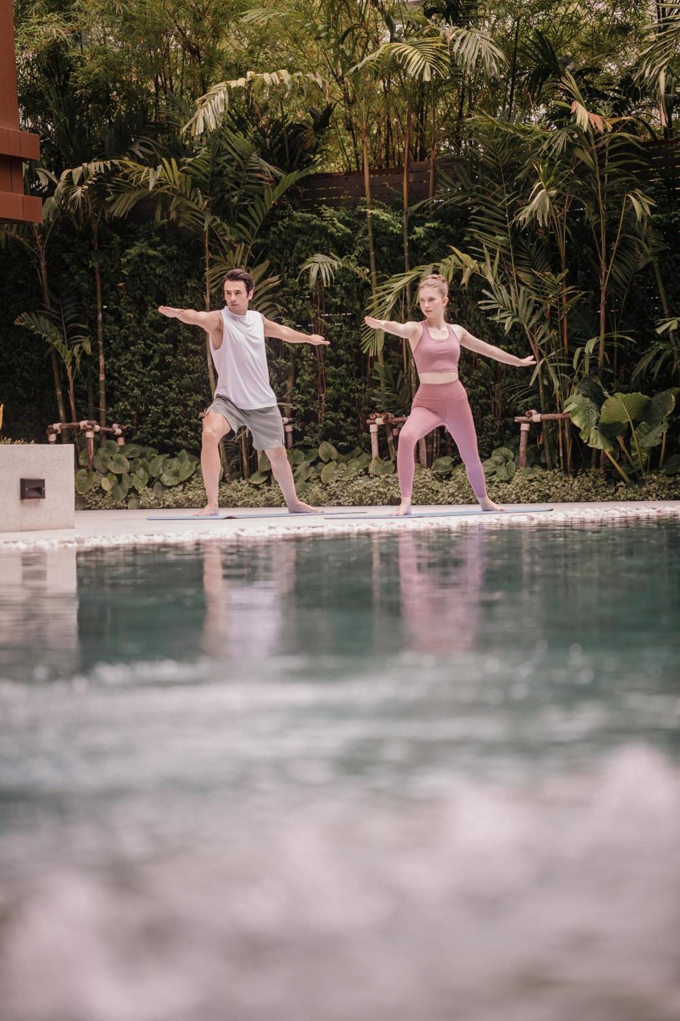 Nysa Hotel Bangkok Sukhumvit 11 Exterior photo A couple practicing yoga