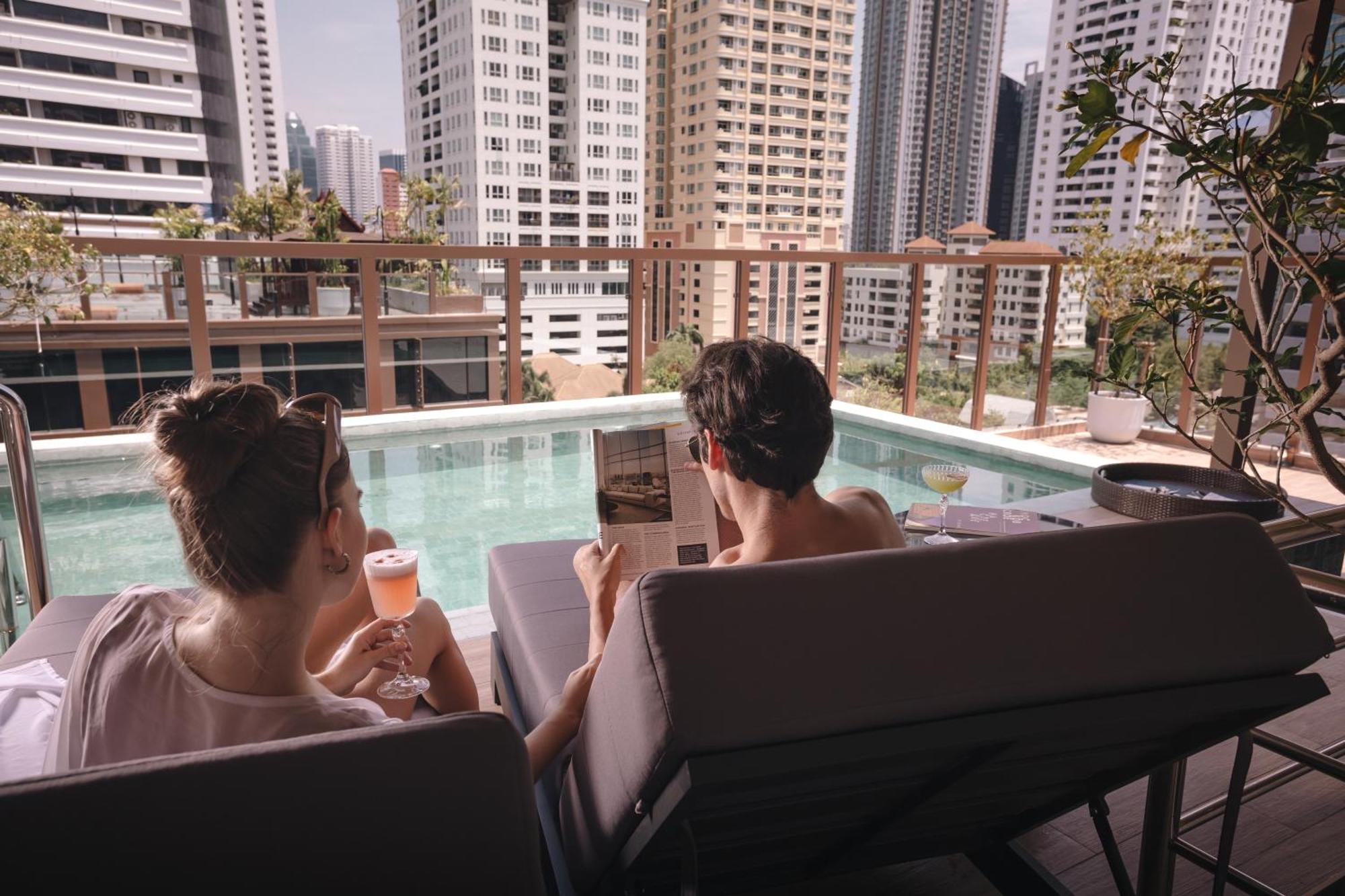 Nysa Hotel Bangkok Sukhumvit 11 Exterior photo The rooftop pool at the hotel